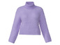 Pull en laine lilas à col roulé.