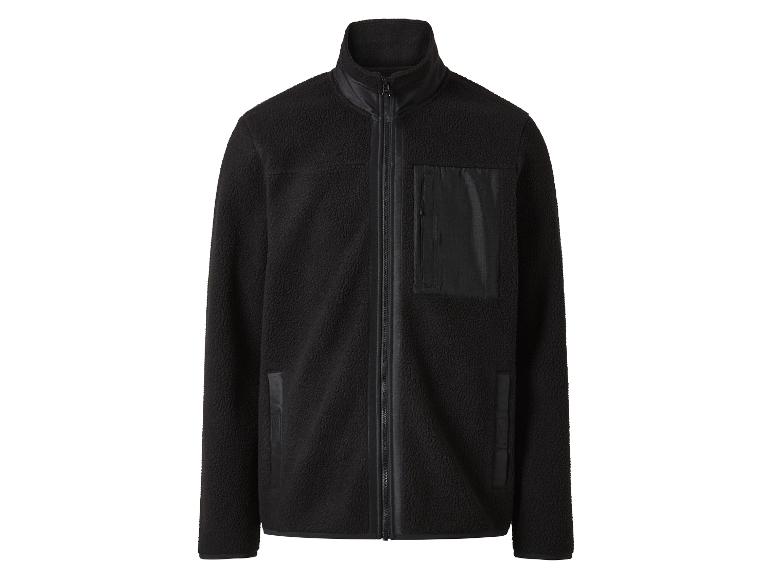 Blouson polaire noir avec poches.