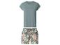 T-shirt vert et short à motifs tropicaux.