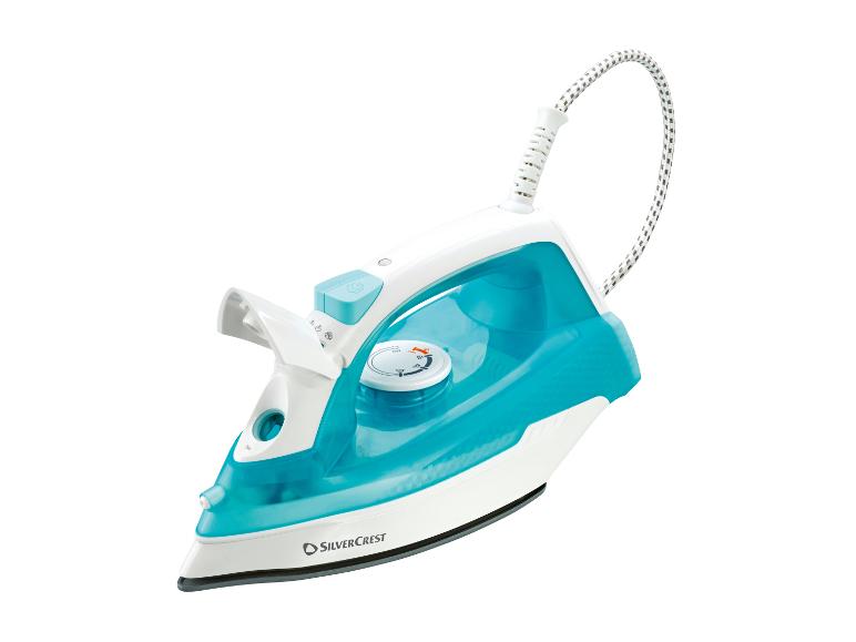 Fer à vapeur blanc et turquoise avec un câble textile