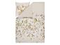 Parure de lit beige avec motif floral blanc et vert.