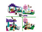 Ensemble LEGO Minecraft avec une maison, un arbre et des animaux.