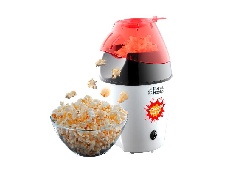 Du pop-corn dans un bol, à côté d'une machine à pop-corn blanche Russell Hobbs.