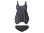 Un maillot de bain noir à pois blancs.