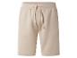 Shorts de survêtement beige avec cordon de serrage à la taille.