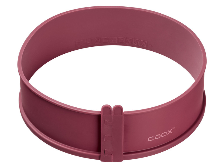 Un moule à pâtisserie en silicone rose de la marque Coox.