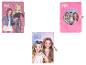Trois carnets Forever Girlie: deux avec des filles dessinées et un rose pelucheux à paillettes.