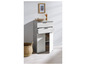 Une armoire blanche avec deux tiroirs et une porte, avec un aspect béton gris.