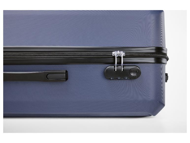 Valise bleue avec fermeture éclair noire et serrure à combinaison.