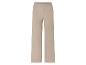 Pantalon en maille beige à jambes larges.