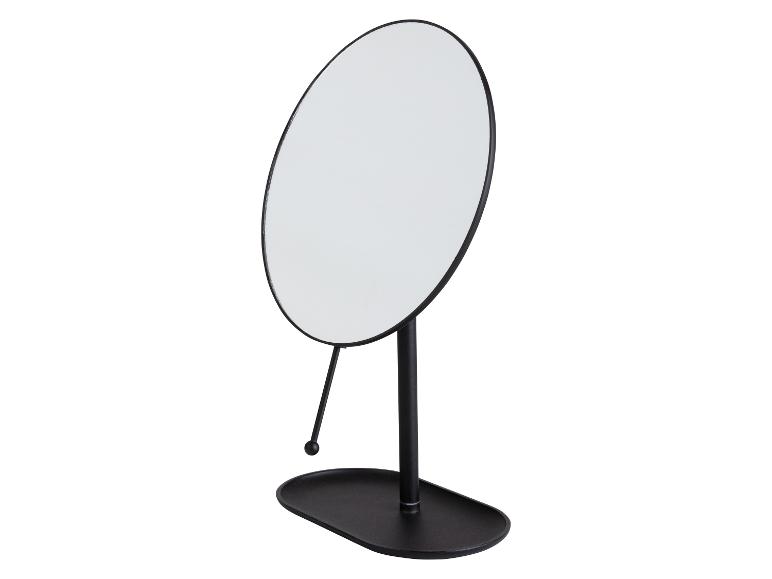 Miroir de table ovale avec pied noir.