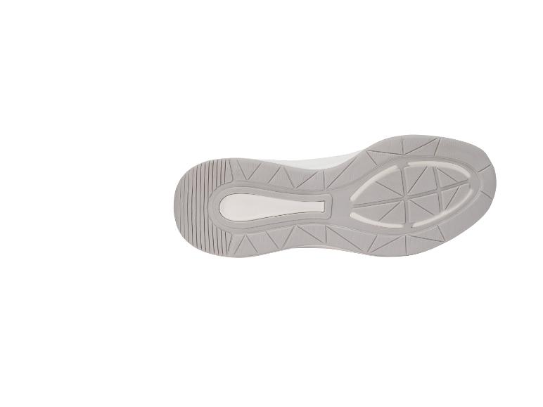 Semelle de chaussure de sport grise et blanche à motif géométrique