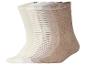Cinq paires de chaussettes dans différentes nuances de beige et de marron, certaines rayées.