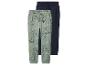 Deux pantalons de jogging pour enfants, un vert à motif dinosaure et un bleu marine.