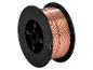 Bobine de fil de soudure cuivre sur support noir.