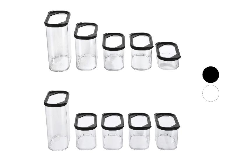 Ensemble de récipients de conservation alimentaire en verre transparent avec couvercles noirs, de différentes tailles.