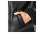 Veste noire en simili cuir avec doublure en fourrure.