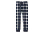 Pantalon de pyjama bleu à carreaux.