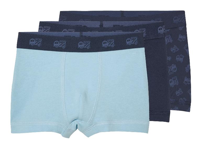 Trois caleçons boxeurs pour enfants, bleu clair et bleu marine.