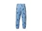 Pantalon de jogging bleu pour enfant avec motif dinosaure.