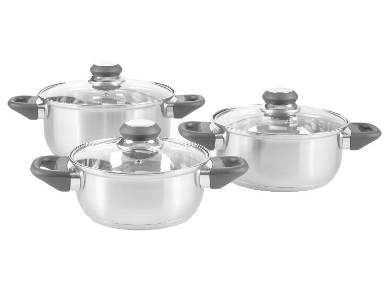 Ensemble de trois casseroles en acier inoxydable avec couvercles en verre.