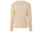 Pull en maille beige à manches longues.