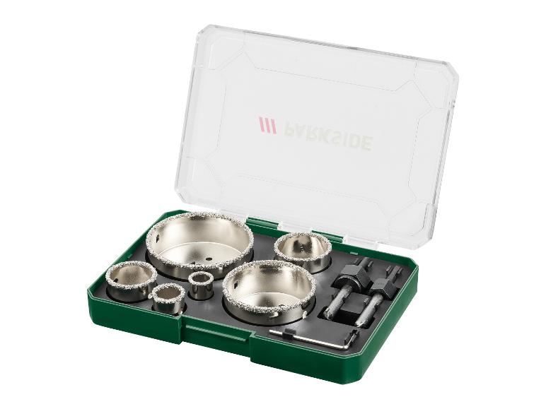Ensemble de trépans diamantés pour le perçage, dans un boîtier vert et transparent.