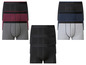 Des boxers noirs, gris et bleus.