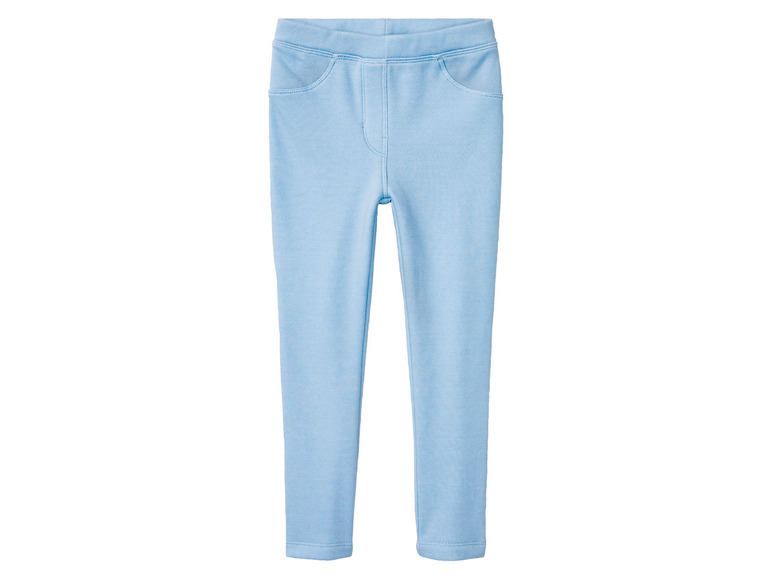 Leggings bleu clair avec des poches.