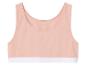 Un soutien-gorge de sport rose avec une bordure blanche.