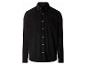 Chemise noire à manches longues en velours côtelé avec boutons et poche poitrine.