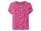 Haut à manches courtes, rose vif à fleurs blanches.