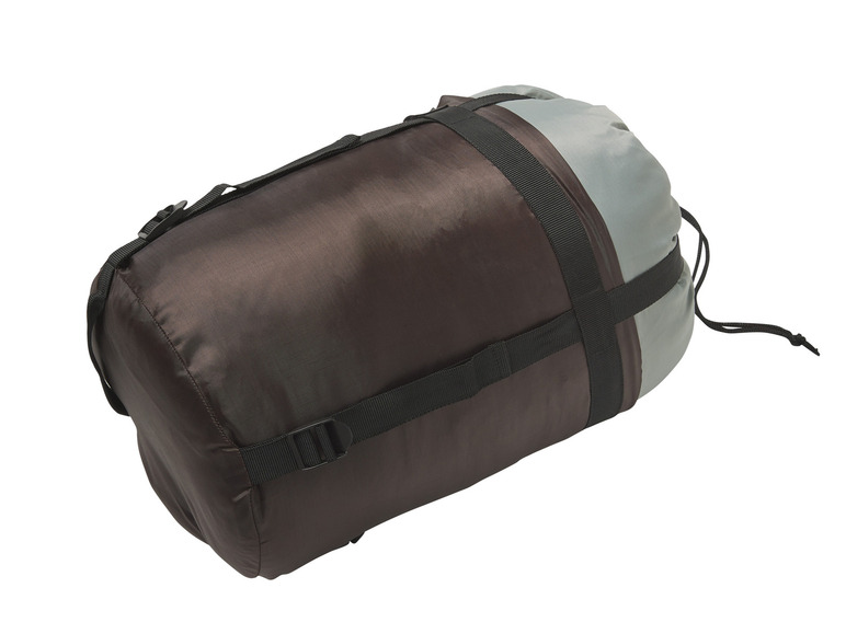 Un sac de couchage marron avec des sangles pour l'emballer.