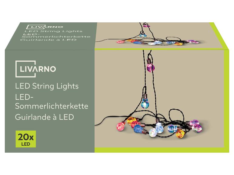 Guirlande lumineuse LED avec 20 ampoules multicolores sur l'emballage.