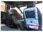 Un organisateur de siège de voiture Frozen avec un support pour tablette et des poches.