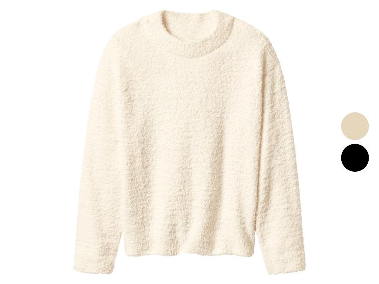 Pull col rond crème texturé, avec options de couleur beige et noir.