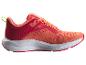 Chaussures de sport femme corail et rouges avec détails vert lime