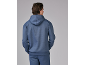 Homme en sweat à capuche bleu et pantalon assorti, vu de dos.