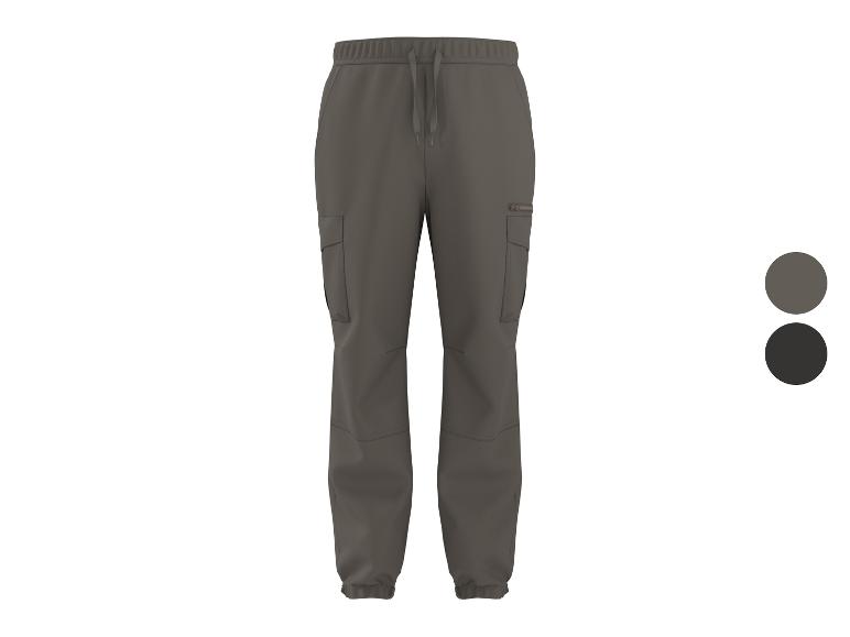 Pantalon cargo gris pour homme avec cordon de serrage à la taille et chevilles côtelées.