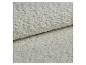 Tissu d'ameublement doux et texturé gris clair avec un pli