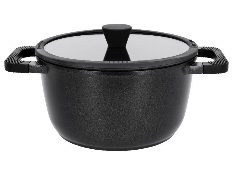 Casserole noire avec couvercle en verre et poignées noires