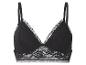Bralette en dentelle noire avec fines bretelles et bande inférieure en maille.