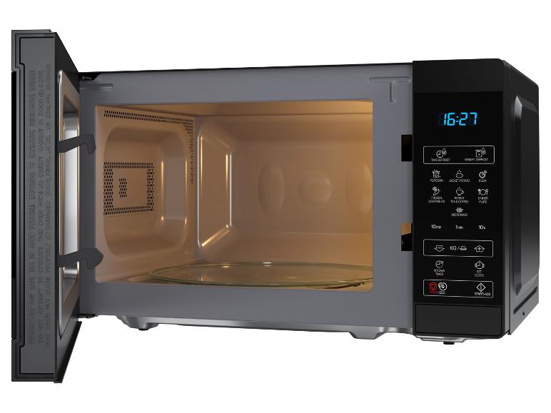 Four à micro-ondes noir avec porte ouverte et affichage numérique 16:27.