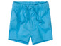 Short bleu avec cordon.