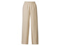 Pantalon beige à taille élastique.