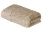 Serviette beige pliée.