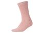 Chaussette rose sur fond blanc