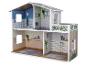 Maison de poupée en bois à deux étages avec quatre pièces décorées