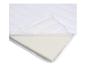 Matelas de lit bébé avec housse matelassée blanche et fermeture éclair montrant l'intérieur en mousse