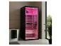 Sauna infrarouge moderne avec éclairage rose dans une salle de bain avec baignoire et plante.